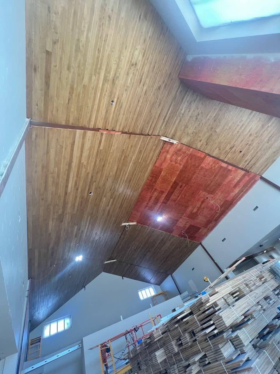 Plank ceiling meeting the plywood