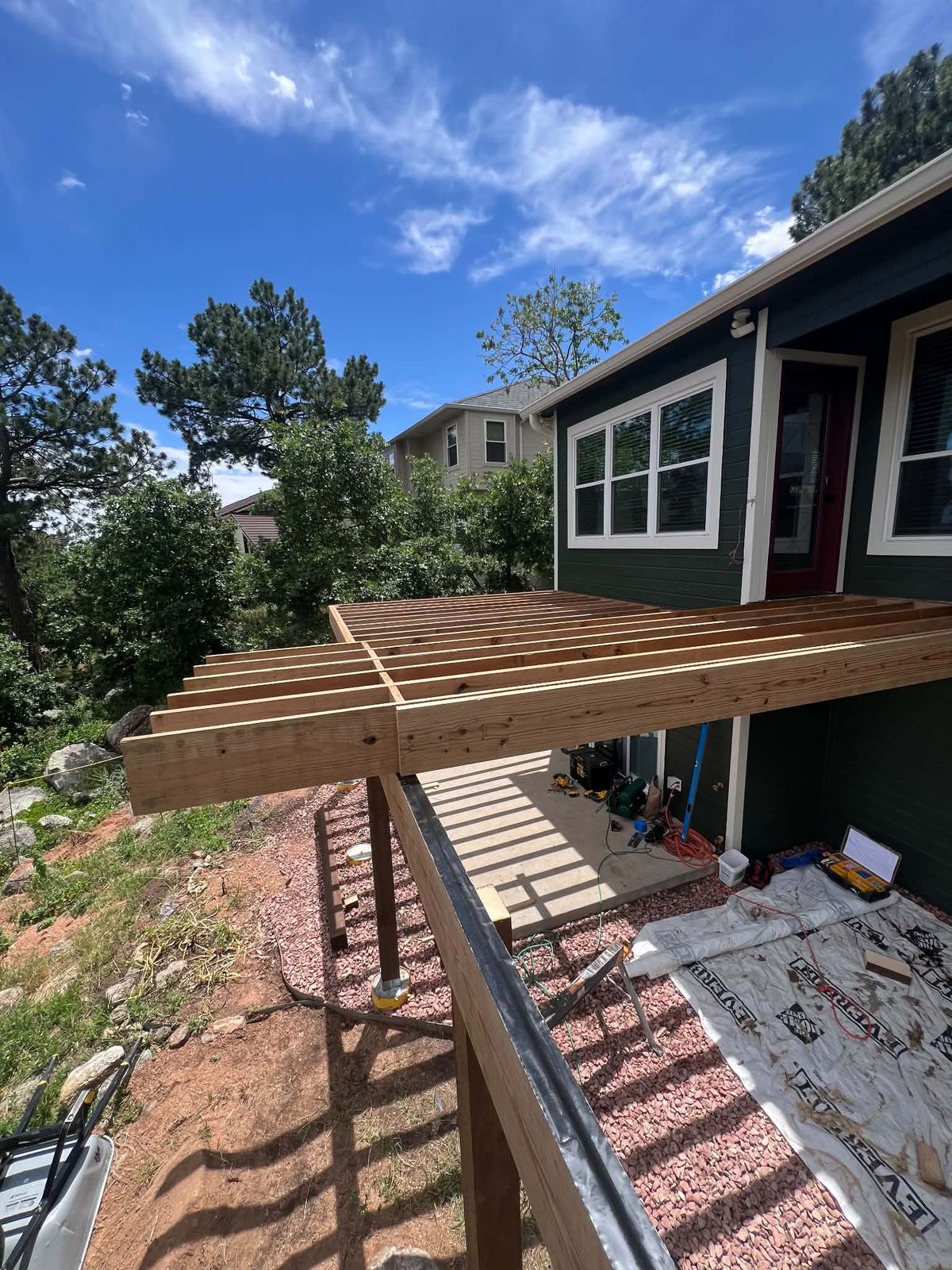Deck joists framed on a slope