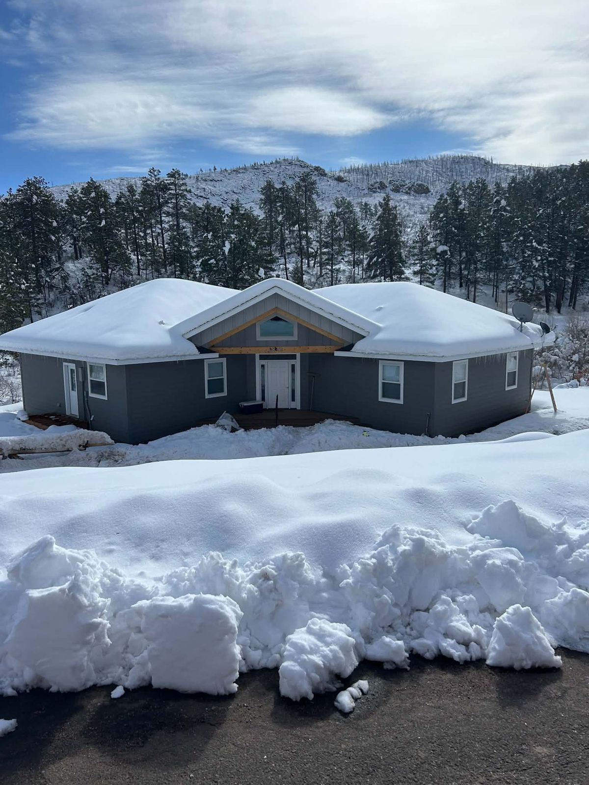 New home after a spring snow